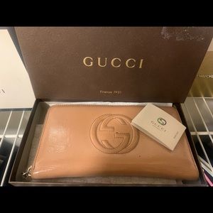 USED AUTHENTIC GUCCI NUDE WALLET